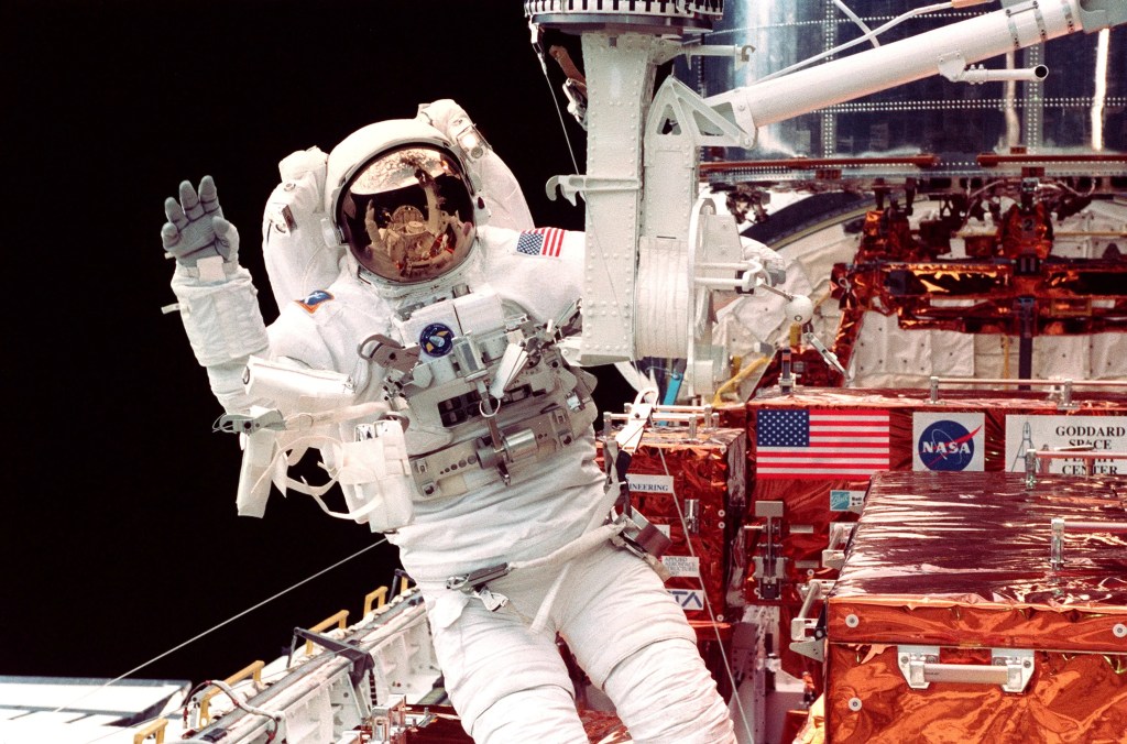 Astronauts spent a total of 57 days, 15 hours, 48 minutes and 8 seconds in space on missions to Hubble.