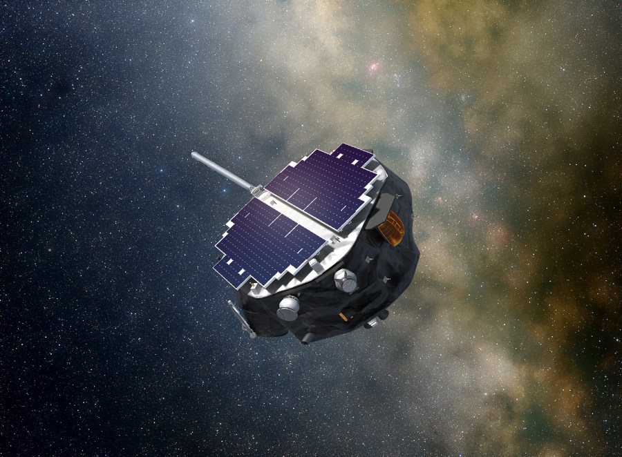 The IMAP spacecraft with a boom extending from one side of its body, depicted in space against a background of stars and cosmic dust